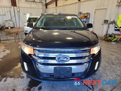 Piąte zdjęcie samochodu w środku: 2011 FORD EDGE VIN:2FMDK3JC6BBA02709 - miniatura