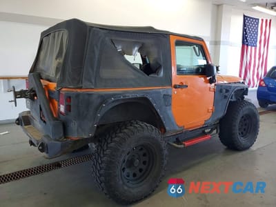 Trzecie zdjęcie samochodu z tyłu: 2012 JEEP WRANGLER SAHARA VIN:1C4AJWBG1CL228607 - miniatura
