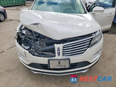 Zdjęcie 12 z 13 samochodu: 2015 LINCOLN MKC VIN:5LMCJ2A94FUJ36421 - miniatura