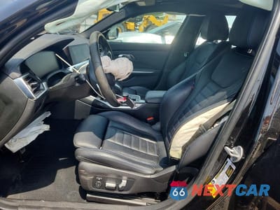 Zdjęcie 7 z 12 samochodu: 2021 BMW 330I VIN:3MW5R1J02M8B86360 - miniatura