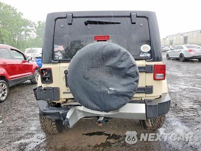 Zdjęcie 6 z 12 samochodu: 2011 JEEP WRANGLER UNLIMITED SAHARA VIN:1J4HA5H15BL627167 - miniatura