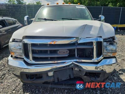 Zdjęcie 11 z 12 samochodu: 2004 FORD F350 SRW SUPER DUTY VIN:1FTSW31P54EC53294 - miniatura
