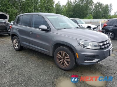 Czwarte zdjęcie samochodu z boku: 2013 VOLKSWAGEN TIGUAN S VIN:WVGBV3AX5DW584594 - miniatura