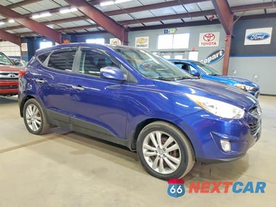 Czwarte zdjęcie samochodu z boku: 2012 HYUNDAI TUCSON LIMITED VIN:KM8JUCAC5CU436936 - miniatura