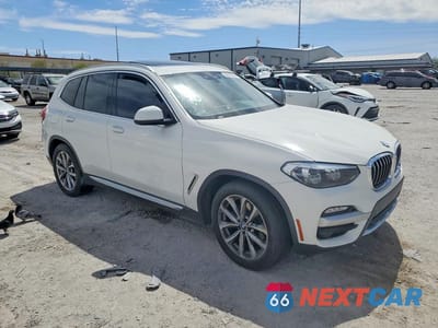 Czwarte zdjęcie samochodu z boku: 2019 BMW X3 SDRIVE30I VIN:5UXTR7C55KLF26467 - miniatura
