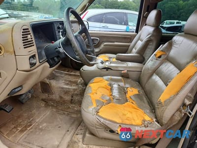 Zdjęcie 7 z 13 samochodu: 1999 CHEVROLET TAHOE C1500 VIN:1GNEC13R5XR150115 - miniatura