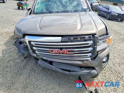 Zdjęcie 11 z 12 samochodu: 2016 GMC CANYON SLE VIN:1GTG6CE3XG1188581 - miniatura