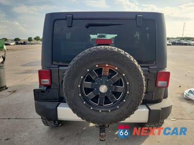 Zdjęcie 6 z 14 samochodu: 2014 JEEP WRANGLER UNLIMITED SAHARA VIN:1C4BJWEG9EL305419 - miniatura