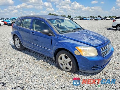 Czwarte zdjęcie samochodu z boku: 2009 DODGE CALIBER SXT VIN:1B3HB48AX9D136063 - miniatura