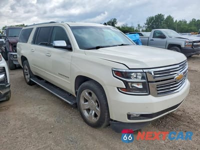 Czwarte zdjęcie samochodu z boku: 2015 CHEVROLET SUBURBAN K1500 LTZ VIN:1GNSKKKC2FR182320 - miniatura