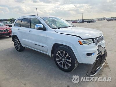 Czwarte zdjęcie samochodu z boku: 2018 JEEP GRAND CHEROKEE OVERLAND VIN:1C4RJECG0JC289374 - miniatura