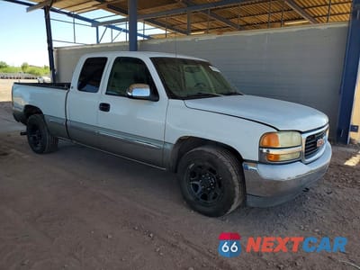 Czwarte zdjęcie samochodu z boku: 2000 GMC NEW SIERRA C1500 VIN:1GTEC19T5YZ173309 - miniatura