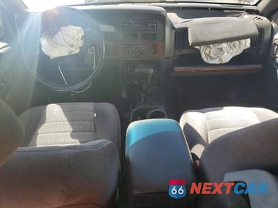 Zdjęcie 8 z 14 samochodu: 1998 JEEP GRAND CHEROKEE VIN:1J4GZ58S9WC242603 - miniatura