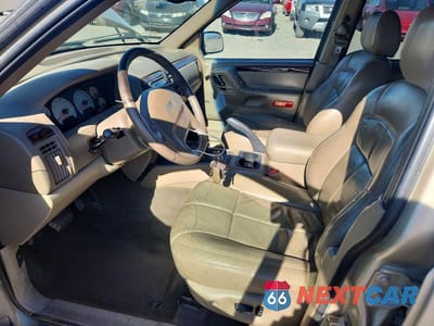 Zdjęcie 7 z 12 samochodu: 2001 JEEP GRAND CHEROKEE LIMITED VIN:1J4GW58N01C627348 - miniatura