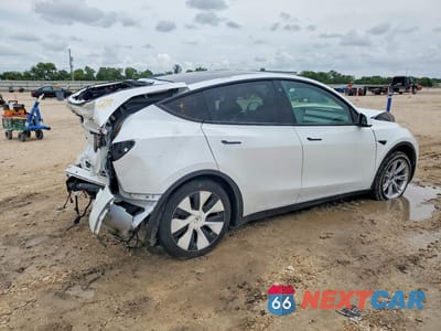 Trzecie zdjęcie samochodu z tyłu: 2021 TESLA MODEL Y VIN:5YJYGDED8MF110626 - miniatura