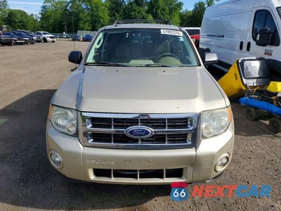 Piąte zdjęcie samochodu w środku: 2011 FORD ESCAPE VIN:1FMCU0D73BKA01008 - miniatura