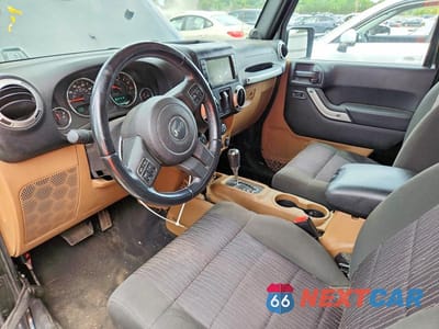 Zdjęcie 8 z 14 samochodu: 2012 JEEP WRANGLER SAHARA VIN:1C4AJWBG4CL220310 - miniatura