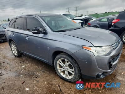 Czwarte zdjęcie samochodu z boku: 2014 MITSUBISHI OUTLANDER SE VIN:JA4AD3A32EZ002249 - miniatura