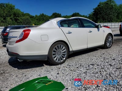 Trzecie zdjęcie samochodu z tyłu: 2016 LINCOLN MKS VIN:1LNHL9DKXGG602041 - miniatura