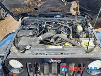 Zdjęcie 12 z 13 samochodu: 2010 JEEP WRANGLER UNLIMITED SAHARA VIN:1J4BA5H18AL205639 - miniatura