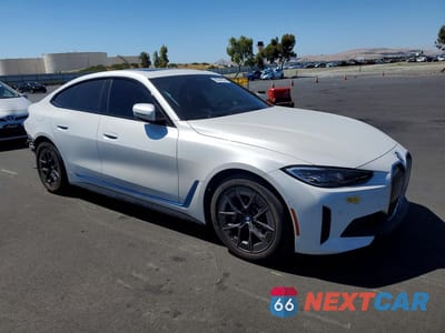 Czwarte zdjęcie samochodu z boku: 2022 BMW I4 EDRIVE 40 VIN:WBY73AW09NFN03189 - miniatura