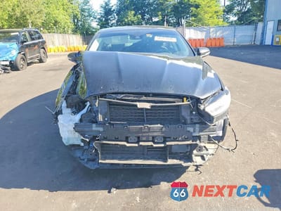 Piąte zdjęcie samochodu w środku: 2016 FORD FUSION TITANIUM PHEV VIN:3FA6P0SU4GR320511 - miniatura