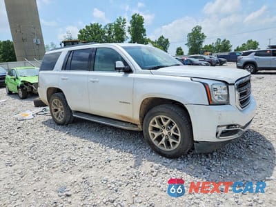Czwarte zdjęcie samochodu z boku: 2018 GMC YUKON VIN:1GKS2BKC2JR268832 - miniatura