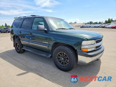 Czwarte zdjęcie samochodu z boku: 2001 CHEVROLET TAHOE K1500 VIN:1GNEK13T61J248896 - miniatura