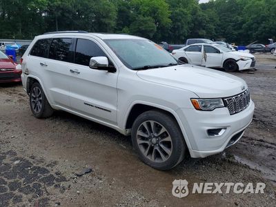 Czwarte zdjęcie samochodu z boku: 2017 JEEP GRAND CHEROKEE OVERLAND VIN:1C4RJECG0HC868312 - miniatura