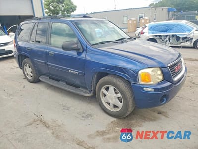 Czwarte zdjęcie samochodu z boku: 2002 GMC ENVOY VIN:1GKDT13SX22499459 - miniatura