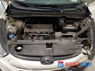 Zdjęcie 12 z 13 samochodu: 2013 HYUNDAI TUCSON GLS VIN:KM8JUCAC6DU604424 - miniatura