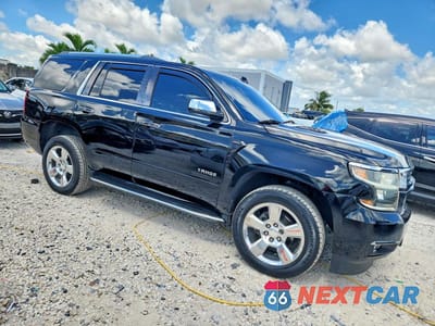 Czwarte zdjęcie samochodu z boku: 2017 CHEVROLET TAHOE K1500 PREMIER VIN:1GNSKCKC3HR160190 - miniatura