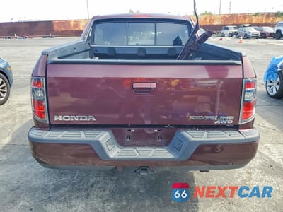 Zdjęcie 6 z 12 samochodu: 2014 HONDA RIDGELINE RTL VIN:5FPYK1F58EB008711 - miniatura