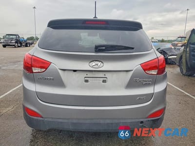 Zdjęcie 6 z 13 samochodu: 2013 HYUNDAI TUCSON LIMITED VIN:KM8JUCAC3DU558132 - miniatura