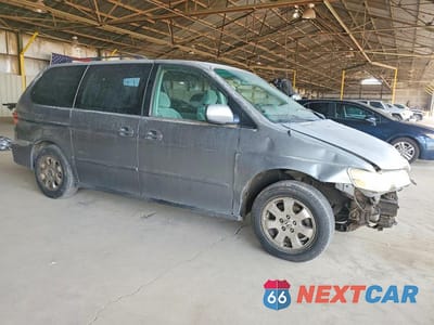 Czwarte zdjęcie samochodu z boku: 2002 HONDA ODYSSEY EX VIN:2HKRL18632H522043 - miniatura