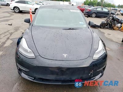 Piąte zdjęcie samochodu w środku: 2022 TESLA MODEL 3 VIN:5YJ3E1EB0NF144154 - miniatura