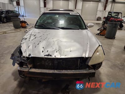 Piąte zdjęcie samochodu w środku: 2003 NISSAN ALTIMA 2.5 VIN:1N4AL11D03C248972 - miniatura