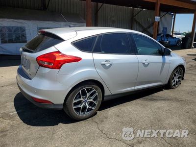 Trzecie zdjęcie samochodu z tyłu: 2017 FORD FOCUS SEL VIN:1FADP3M25HL219479 - miniatura