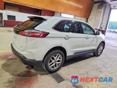 Trzecie zdjęcie samochodu z tyłu: 2023 FORD EDGE SEL VIN:2FMPK4J97PBA45180 - miniatura