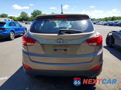 Zdjęcie 6 z 12 samochodu: 2010 HYUNDAI TUCSON GLS VIN:KM8JT3AC3AU076498 - miniatura