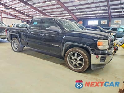 Czwarte zdjęcie samochodu z boku: 2015 GMC SIERRA C1500 VIN:1GTR1TEHXFZ315820 - miniatura