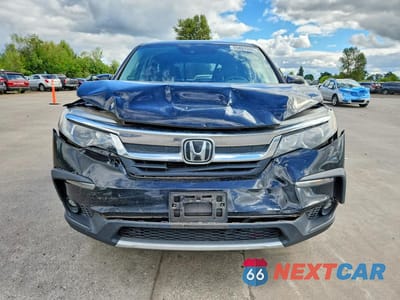 Piąte zdjęcie samochodu w środku: 2020 HONDA PILOT EXL VIN:5FNYF6H58LB026663 - miniatura