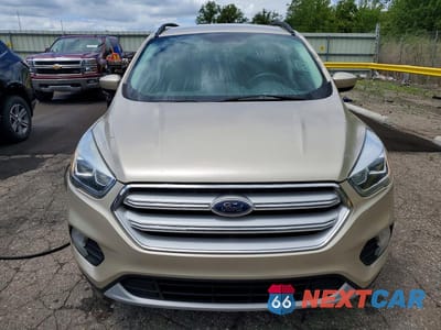 Piąte zdjęcie samochodu w środku: 2018 FORD ESCAPE SEL VIN:1FMCU9HD3JUA40947 - miniatura