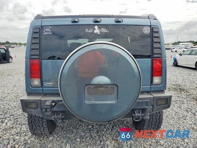 Zdjęcie 6 z 12 samochodu: 2006 HUMMER H2 VIN:5GRGN23U16H102460 - miniatura