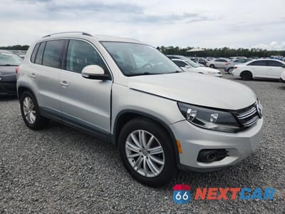 Czwarte zdjęcie samochodu z boku: 2013 VOLKSWAGEN TIGUAN S VIN:WVGAV3AX5DW617248 - miniatura