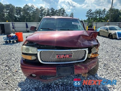 Piąte zdjęcie samochodu w środku: 2003 GMC YUKON DENALI VIN:1GKEK63U13J246236 - miniatura
