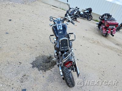 Czwarte zdjęcie samochodu z boku: 1999 HARLEY-DAVIDSON FXDWG VIN:1HD1GEV19XY327750 - miniatura
