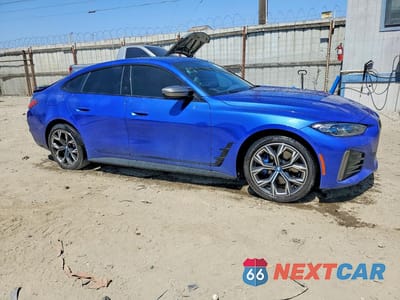 Czwarte zdjęcie samochodu z boku: 2024 BMW I4 M50 VIN:WBY33AW03RFR75330 - miniatura