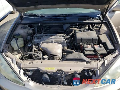 Zdjęcie 11 z 12 samochodu: 2003 TOYOTA CAMRY LE VIN:4T1BE32K83U154894 - miniatura