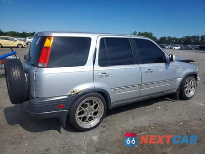 Trzecie zdjęcie samochodu z tyłu: 1999 HONDA CRV VIN:JHLRD1866XC013759 - miniatura